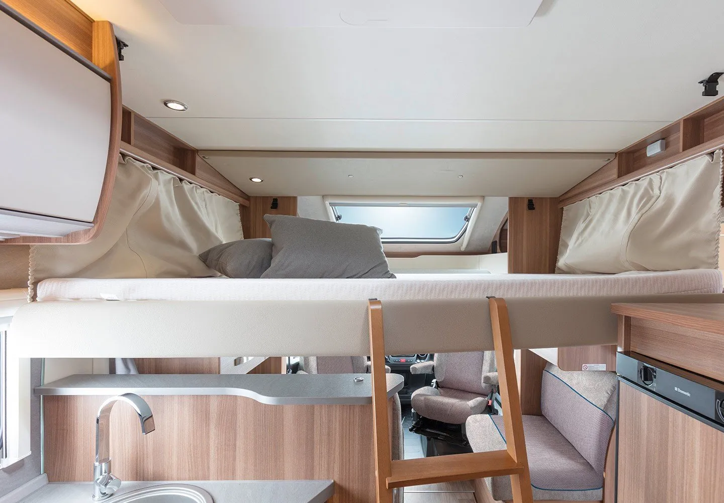 Drop-down bed mechanism